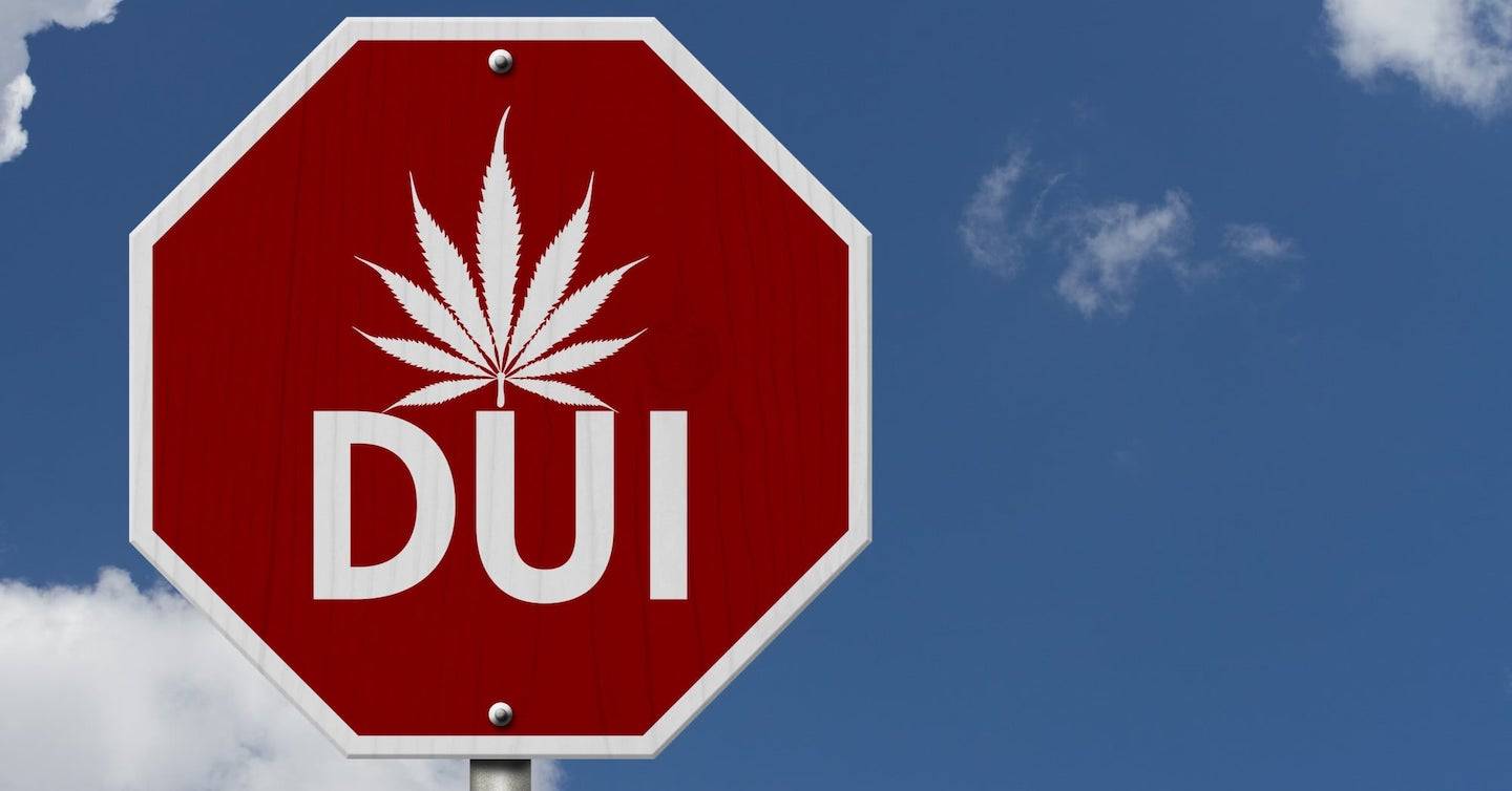 Marijuana leaf on a stop sign